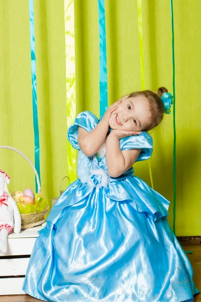 Beautiful girl in a blue dress — Stock Photo, Image