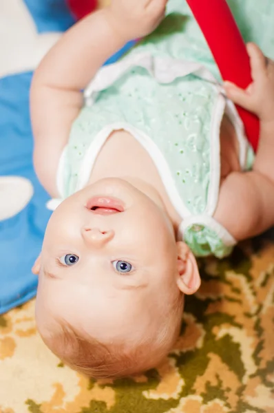 Little baby playing with toys — Stock Photo, Image