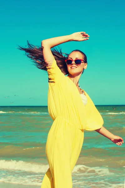 Young beautiful girl in swimsuit and sunglasses — Stock Photo, Image