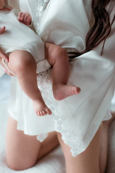 Hands Mom Holding Tiny Cute Baby Feet Happy Motherhood Healthy — Foto de Stock