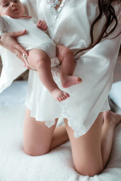 Hands Mom Holding Tiny Cute Baby Feet Happy Motherhood Healthy — Zdjęcie stockowe