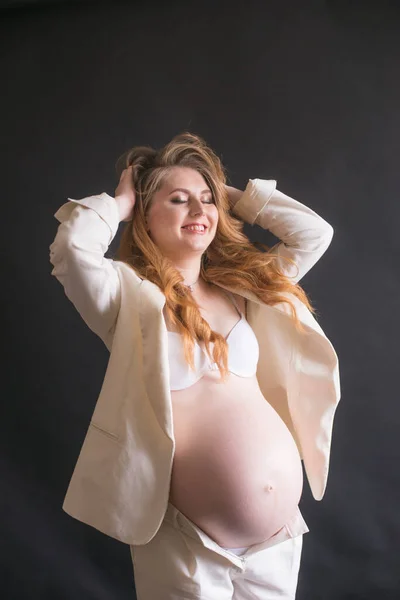 Young Cute Pregnant Woman Long Red Hair White Trouser Suit — Zdjęcie stockowe