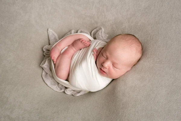 Cute Baby Sleeps Wrapped Airy Milk Colored Blanket Beige Plaid — Stock Photo, Image