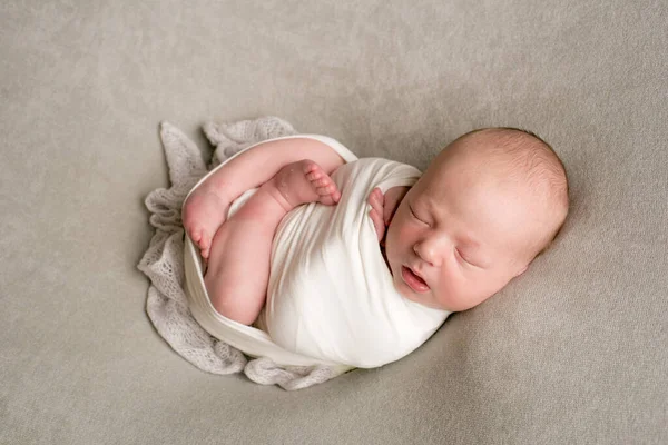 Cute Baby Sleeps Wrapped Airy Milk Colored Blanket Beige Plaid — Stock fotografie