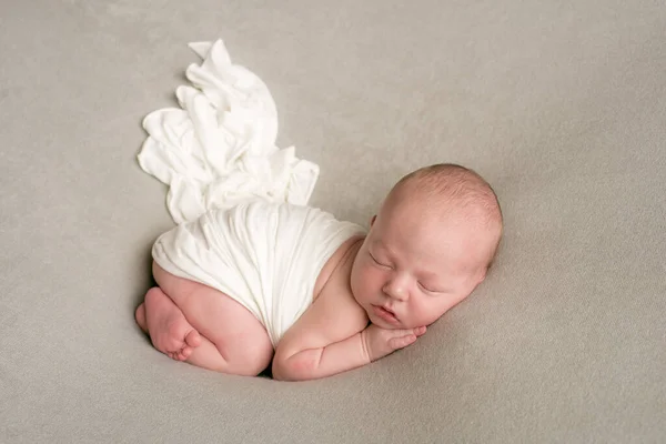 Cute Baby Sleeps Wrapped Airy Milk Colored Blanket Beige Plaid — Stockfoto
