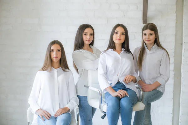 Pretty Teenage Girls Models Trendy Jeans White Shirts Studio Background - Stock-foto