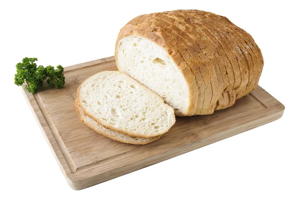 Κοπεί άσπρο ψωμί στο ξύλινο ταμπλό με μαϊντανό — Φωτογραφία Αρχείου