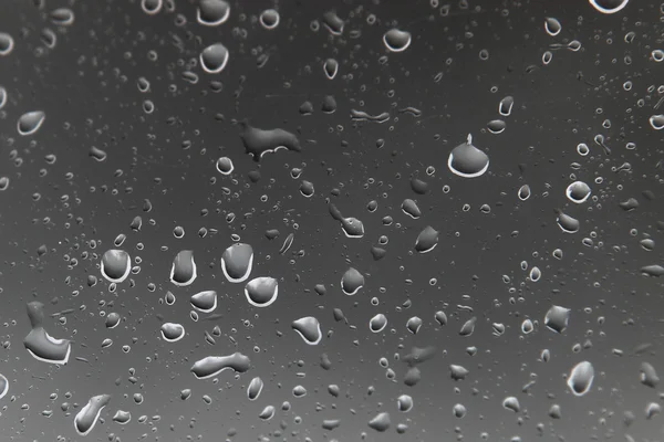 Gotas de agua en una ventana — Foto de Stock