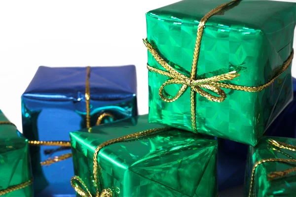 Blue and green wrapped gifts — Stock Photo, Image