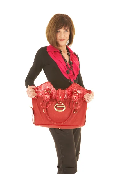 Sexy junge erwachsene kaukasische Geschäftsfrau mit einer roten Ledertasche — Stockfoto
