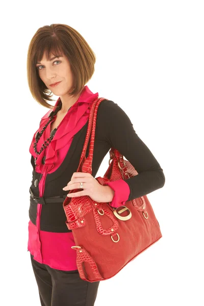 Sexy young adult Caucasian businesswoman with a red leather bag — Stock Photo, Image