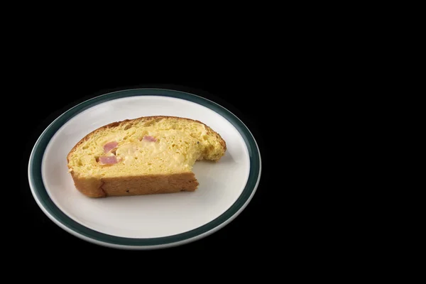 Slice of bread on plate — Stock Photo, Image