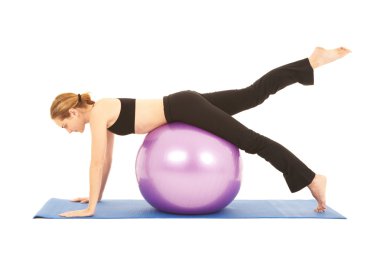 uygun genç esmer gösterilen farklı egzersizler pilates eğitmeni