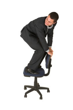 işadamı bir ofis koltuğu üzerinde.