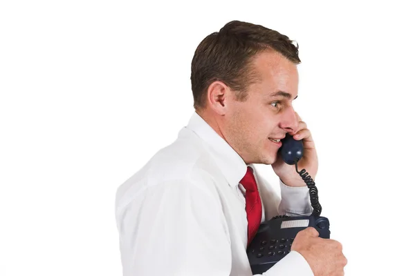 Business man in a suit with a telephone — Stock Photo, Image