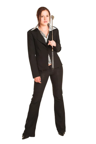 Business woman holding a golf putter — Stok fotoğraf