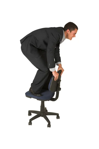 Üzletember egy szék. — Stock Fotó