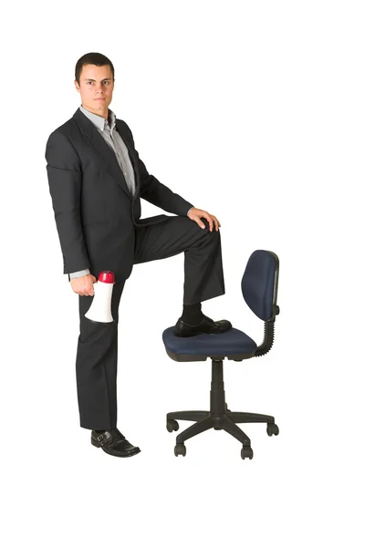 商人在办公室椅子上用喊话器 — 图库照片