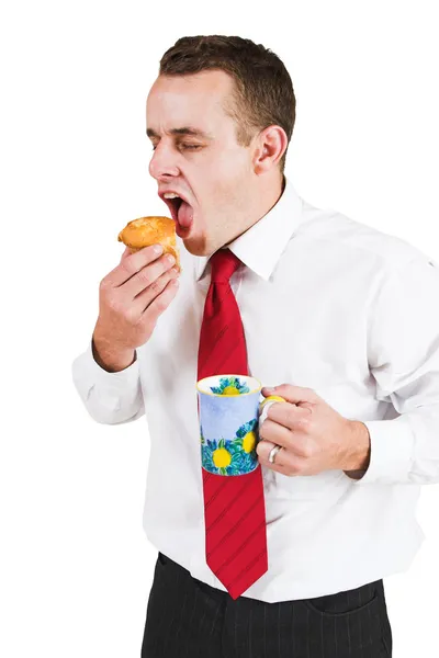 Businessman eating — Stock Photo, Image