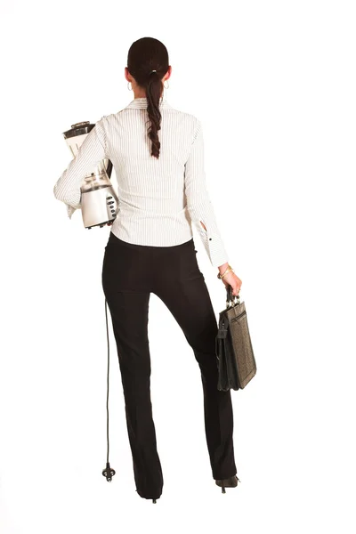 Business woman carrying a leather suitcase and a blender — Stock Photo, Image