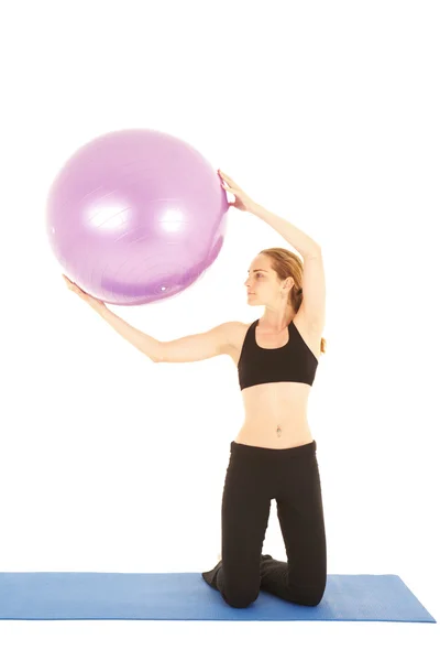 Fit young brunette pilates instructor showing different exercises — Stock Photo, Image