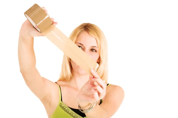 Blonde business lady holding a piece of tape — Stock Photo, Image