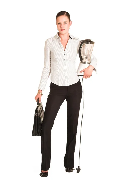 Business woman carrying a leather suitcase and a blender — Stock Photo, Image