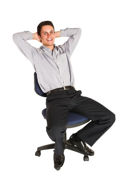 Empresário relaxante em uma cadeira de escritório — Fotografia de Stock