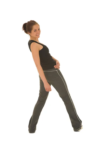 Brunette with black top and trainers — Stock Photo, Image