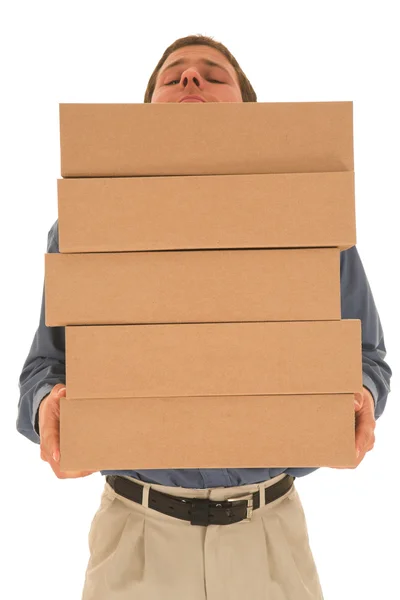 Homme portant des boîtes. — Photo