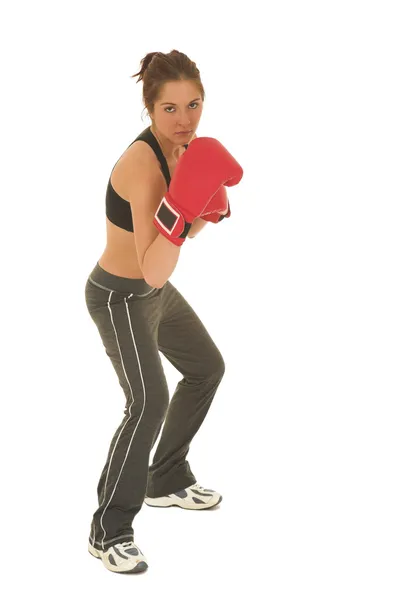 Morena com luvas de boxe vermelho — Fotografia de Stock