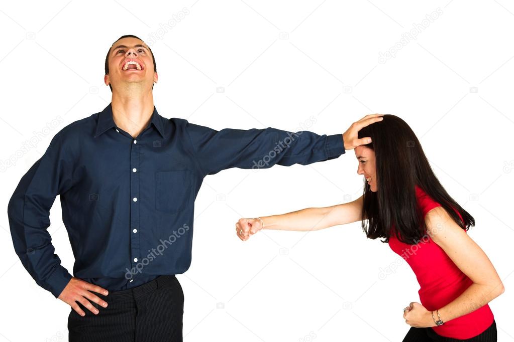 Businessman fighting with businesswoman