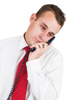 mavi bir telefon ile takım elbiseli bir adam iş