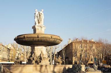 The central roundabout fountains in Aix-en-Provence, France clipart