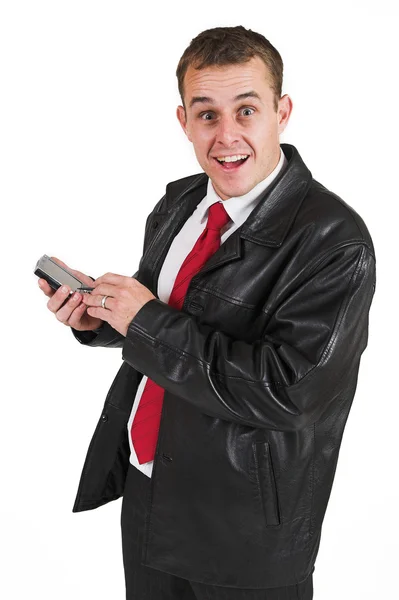 Homem de negócios com jaqueta de couro preto e PDA — Fotografia de Stock