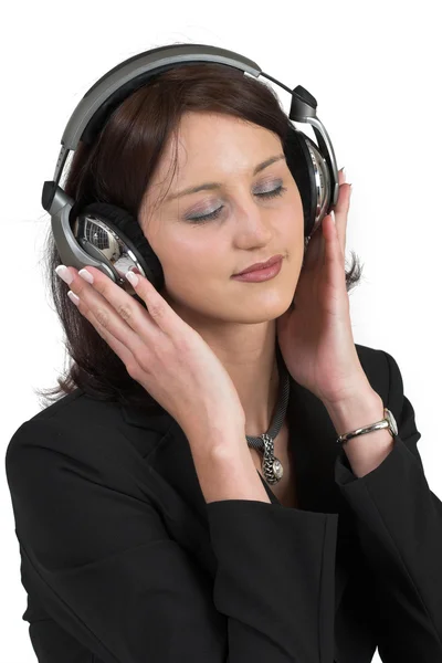 Woman in formal black suit with headset on head — Stock Photo, Image