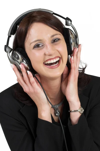 Woman in formal black suit with headset on head — Stock Photo, Image