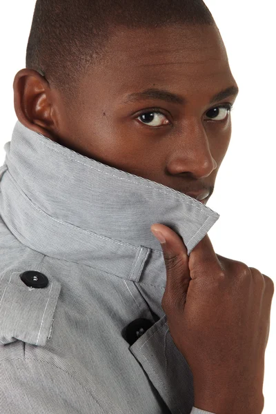 African businessman in a formal suite and grey jacket — Stock Photo, Image