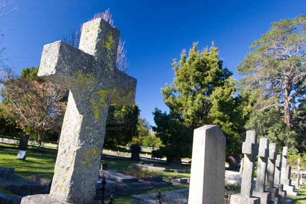 Old stone Grave in the shape of a cross — Stock Photo, Image