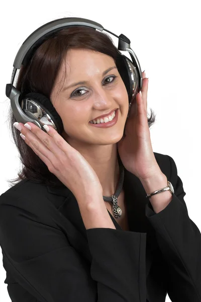 Woman in formal black suit with headset on head — Stock Photo, Image