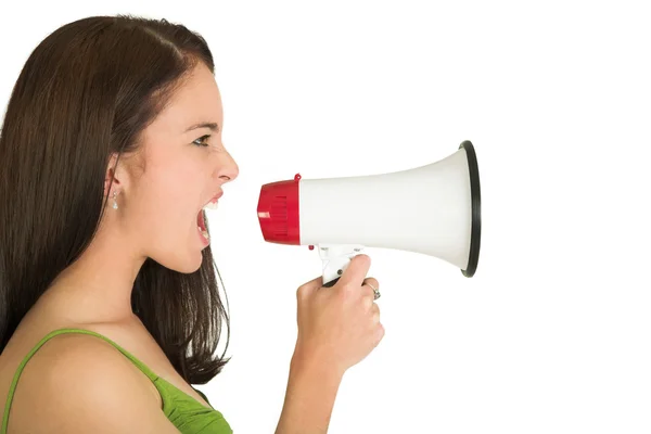 Portrait of a brunette woman, wearing a green top, holding a megaphone — Stock Photo, Image