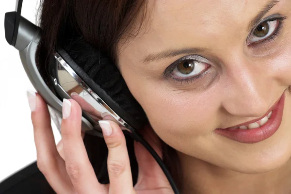 Woman in formal black suit with headset on head — Stock Photo, Image