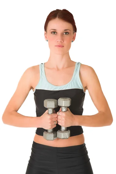 Sexy young adult Caucasian woman in a black training wear with small weights — Stock Photo, Image