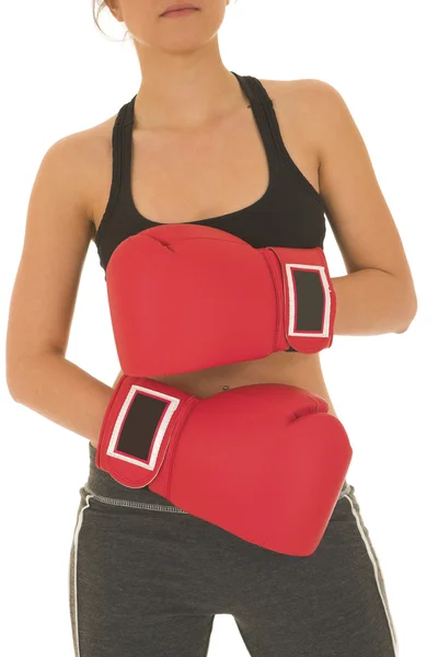 Sexy young adult Caucasian woman in a training wear with boxing gloves — Stock Photo, Image