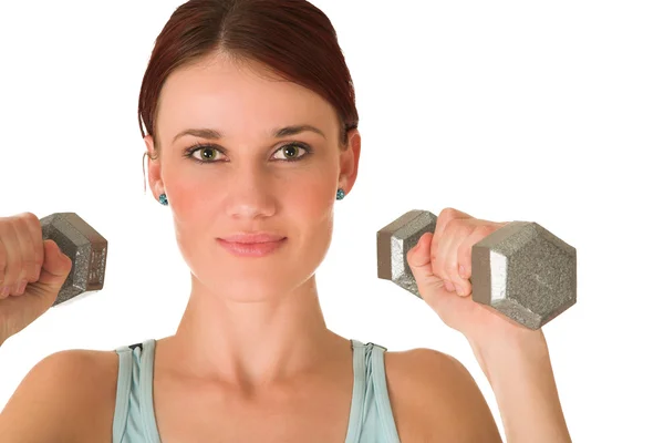 Sexy young adult Caucasian woman in a black training wear with small weights — Stock Photo, Image