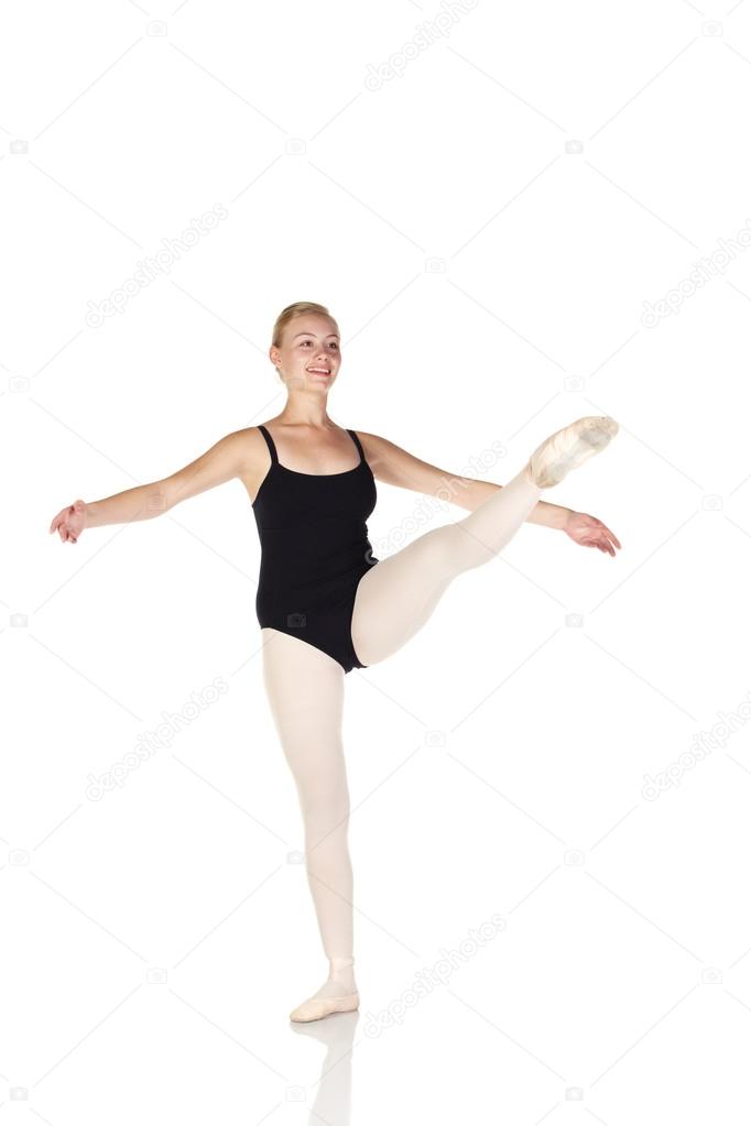 Young caucasian ballerina girl on white background