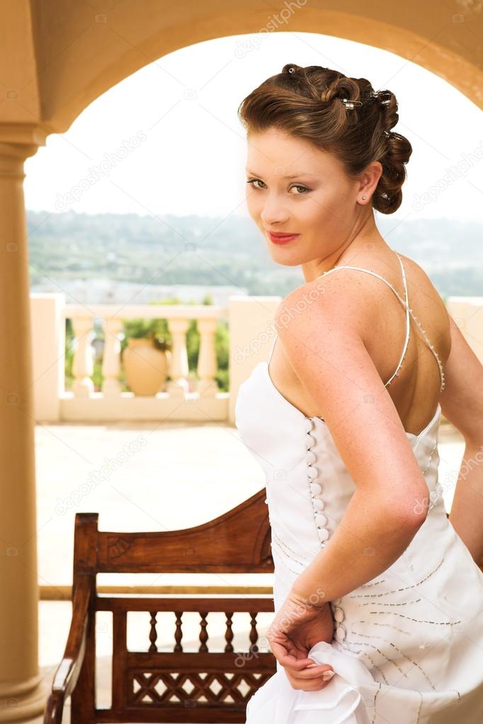 Young beautiful brunette bride