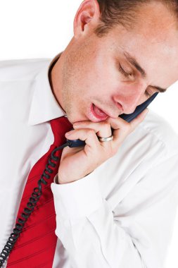 işadamı telefonun yanında uyur