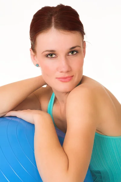Woman resting with blue gym ball. — Stock Photo, Image