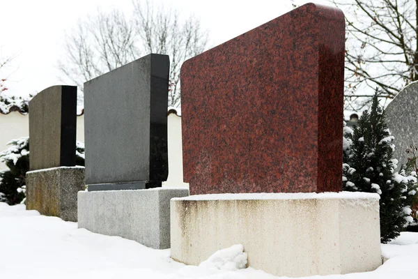 Gravestones in a row. covered in snow. Copy space. — Stock Photo, Image